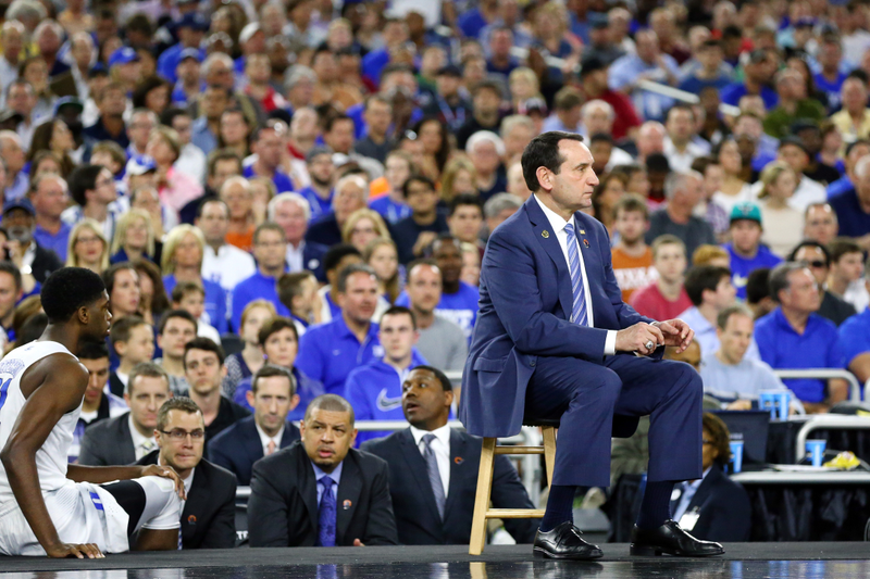 Illustration for article titled Eight Photos Of Coach K Sitting On A Lil' Stool